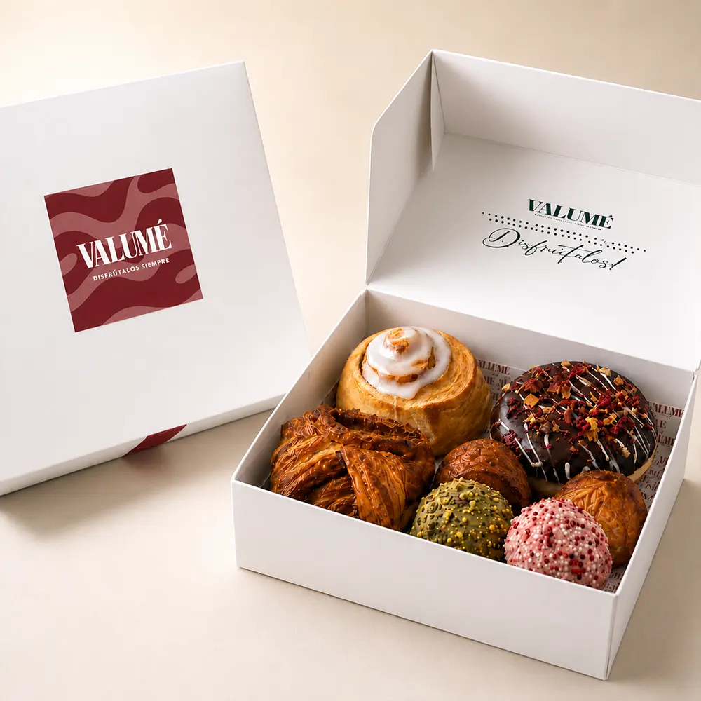 Caja de dulces Valumé con surtido de donuts, rollitos y bocados individuales